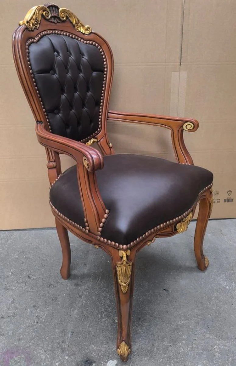 Luxury baroque leather dining chair with armrests black / brown / gold H. 108 cm